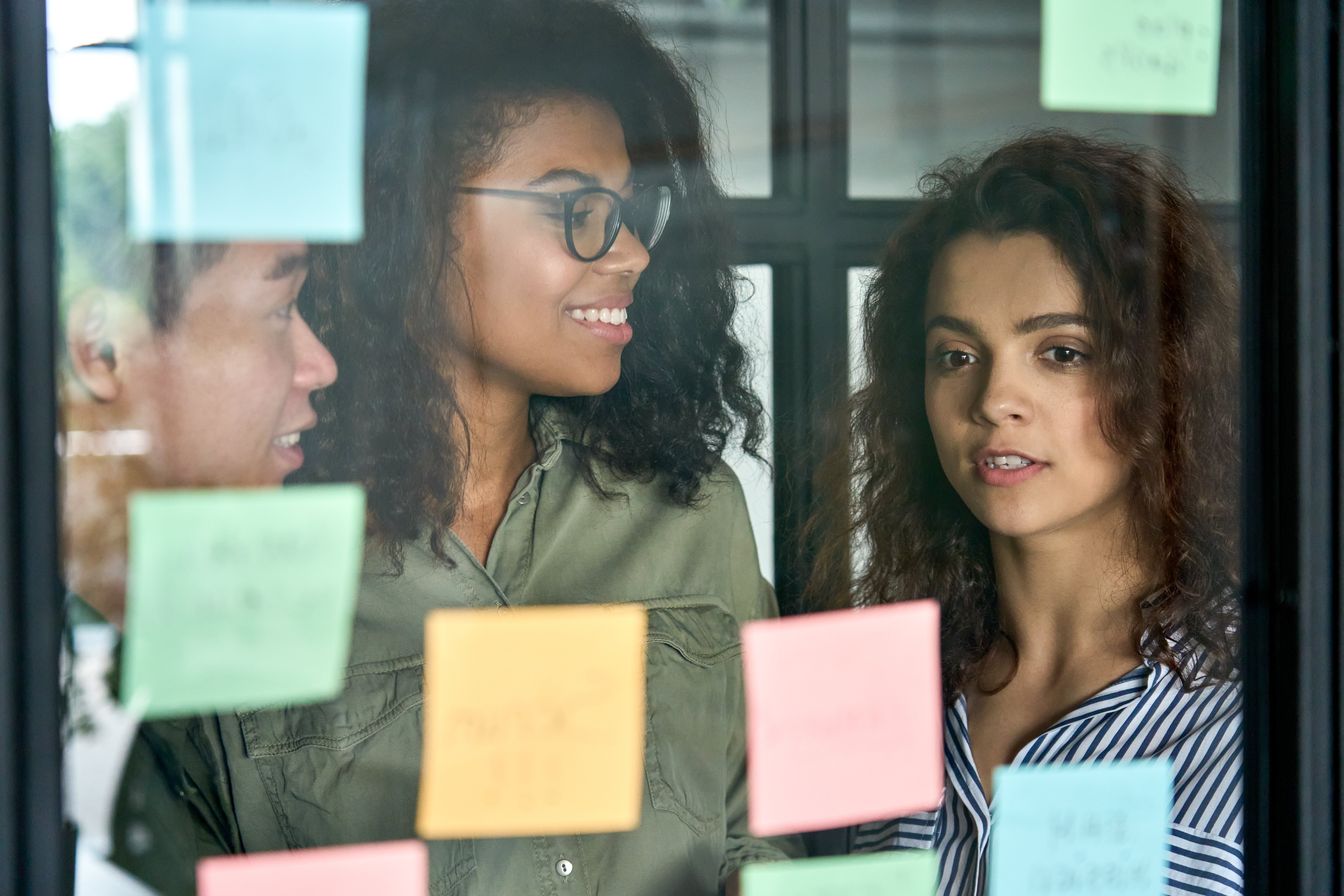 A group of employees inside a conference room